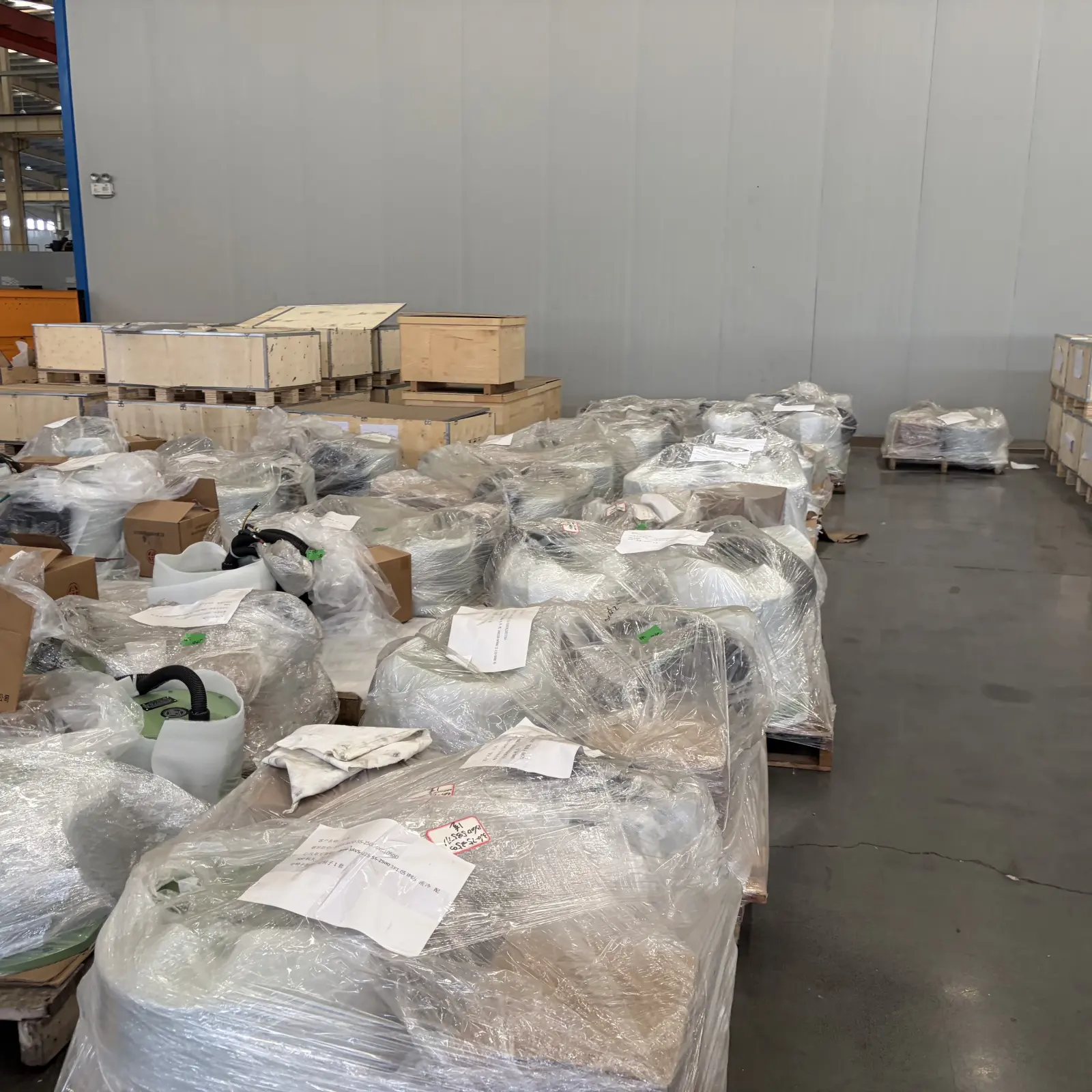 Wrapped equipment and wooden shipping crates