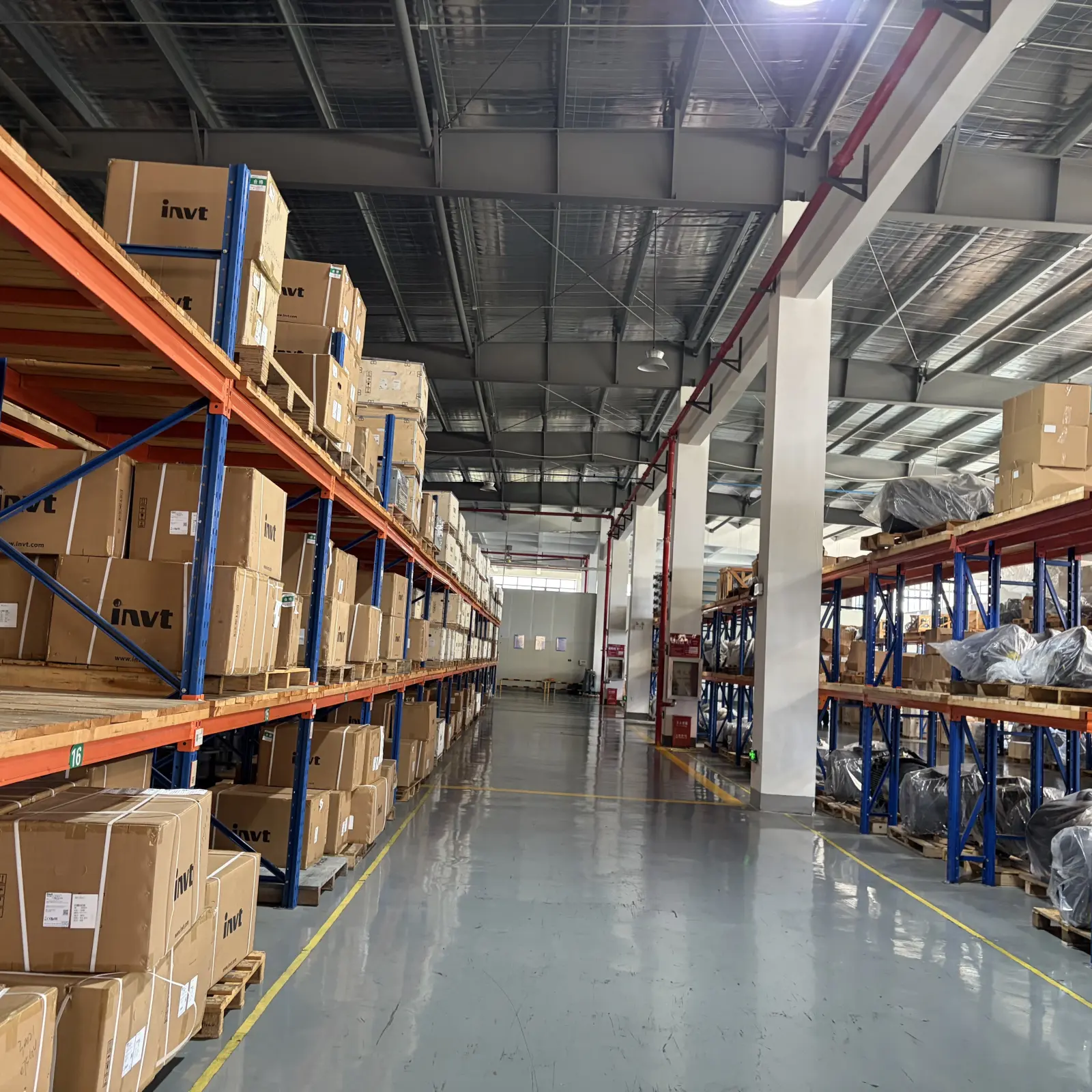 High warehouse racks and stock aisle