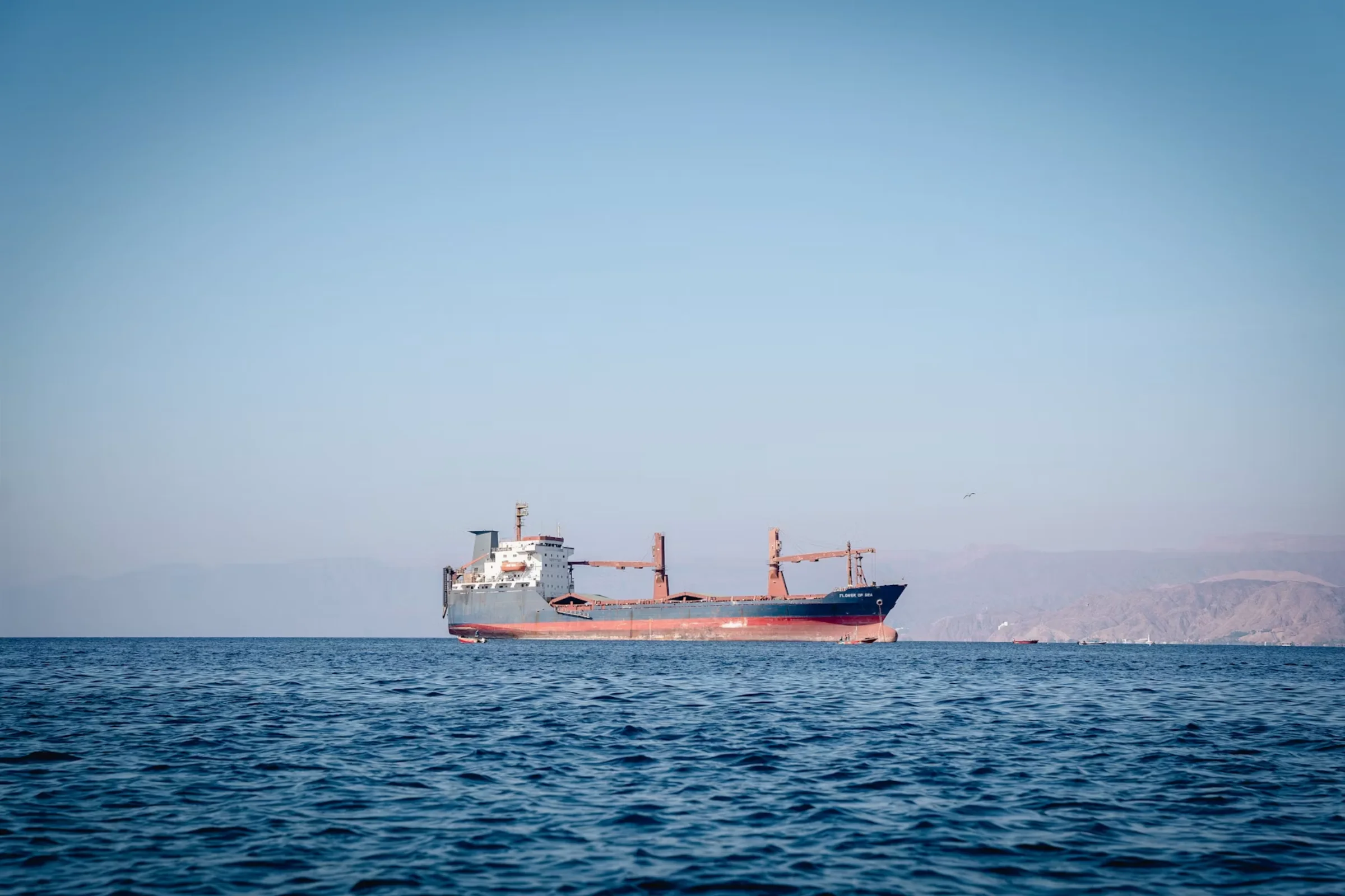 Cargo vessel sailing at sea for fast marine spare parts quotation